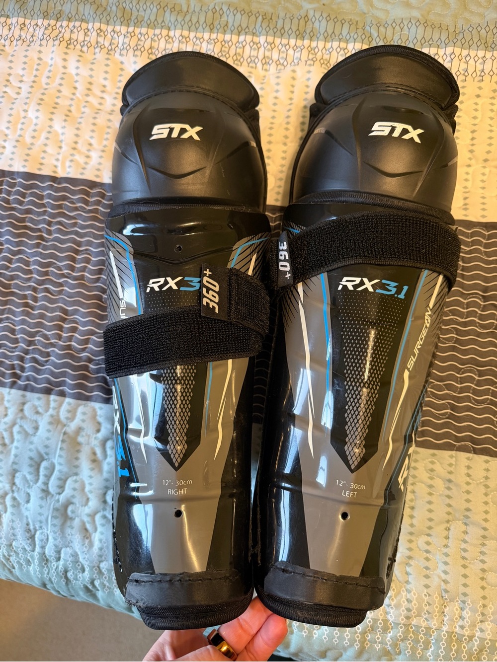 STX RX3.1 Hockey Shin Guards in Black with Blue Accents